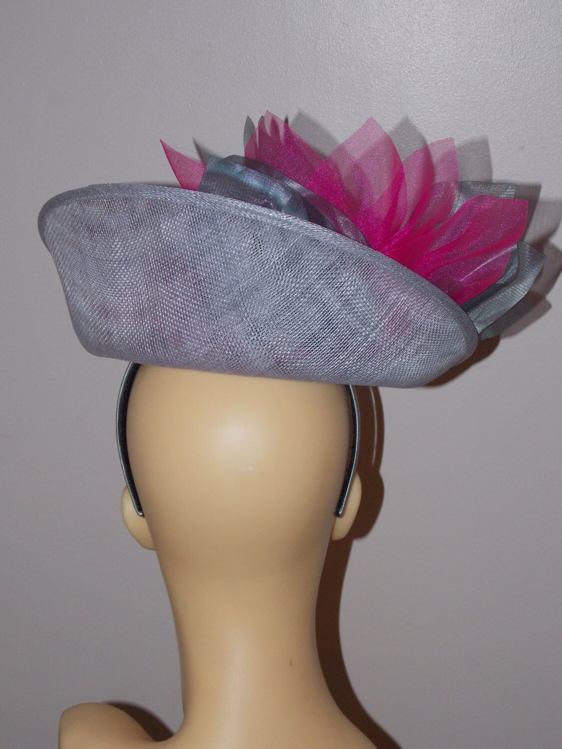 Silver Grey uptured saucer with Cerise & Silver organza flower by Hats2go