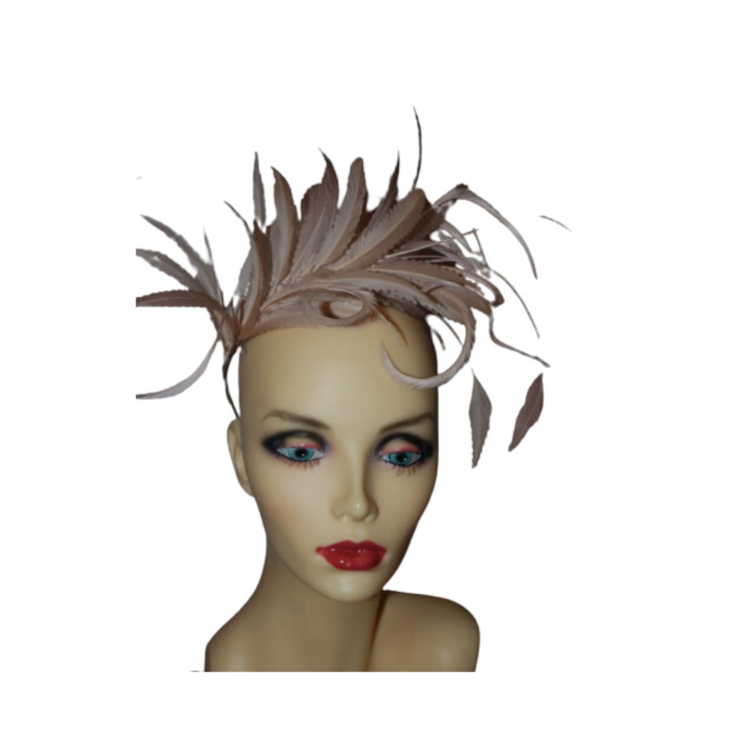 Nude feather  fascinator with metal headband by Hats2go