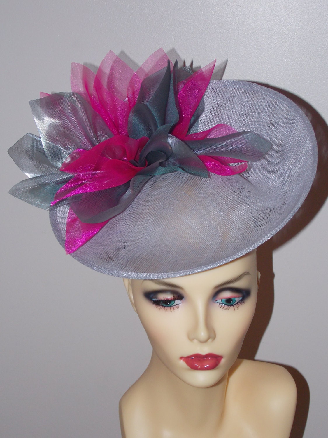 Silver Grey uptured saucer with Cerise & Silver organza flower  by Hats2go