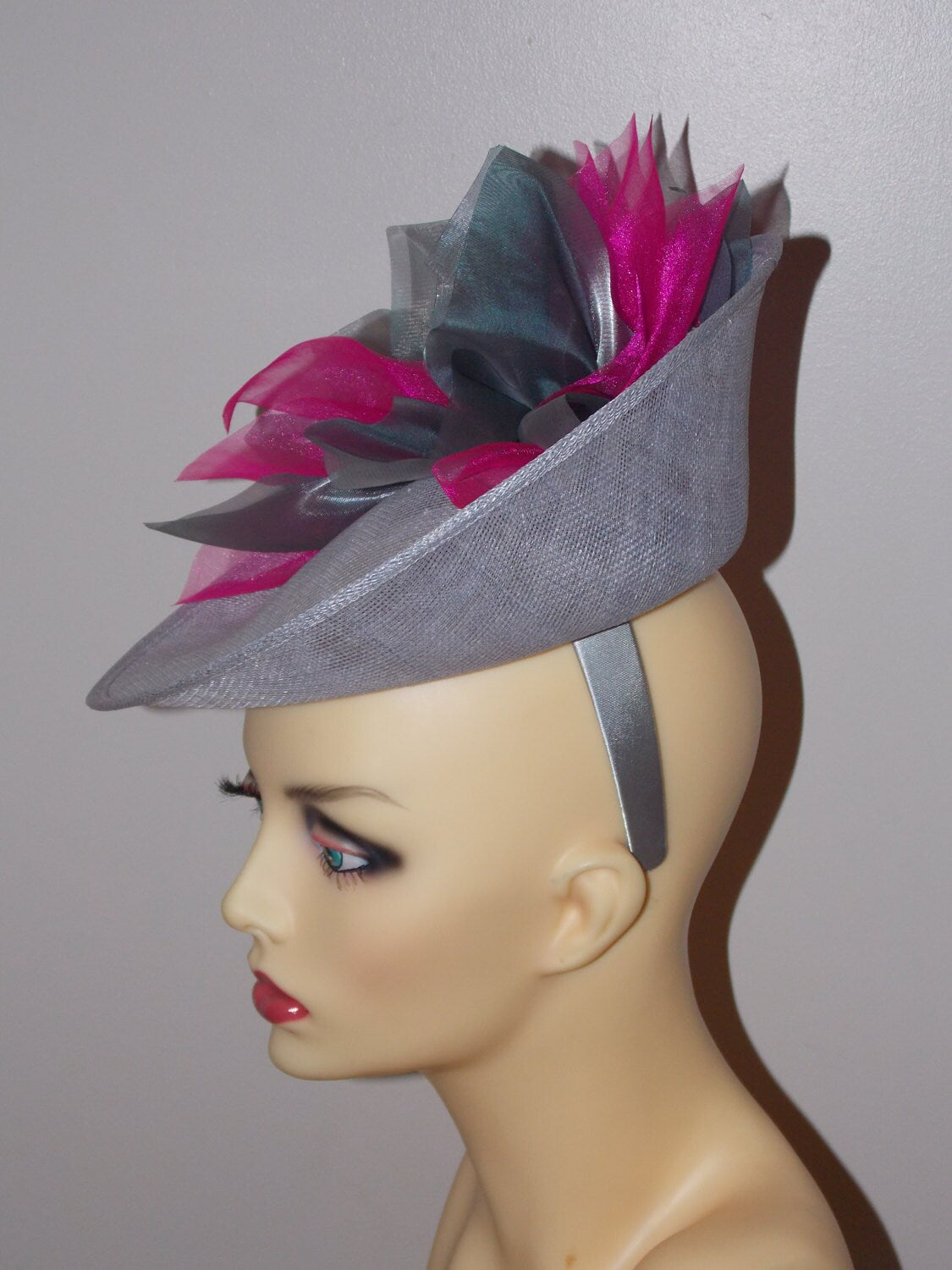 Silver Grey uptured saucer with Cerise & Silver organza flower  by Hats2go