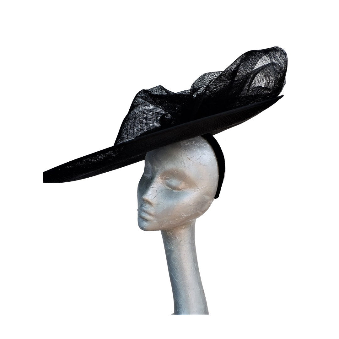 Sazz - Large round Black feature saucer hatinator with Large Black Sinamay bow