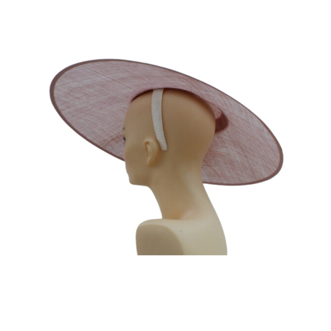 Medium detailed Nude Sinamay fascinator/ Hat