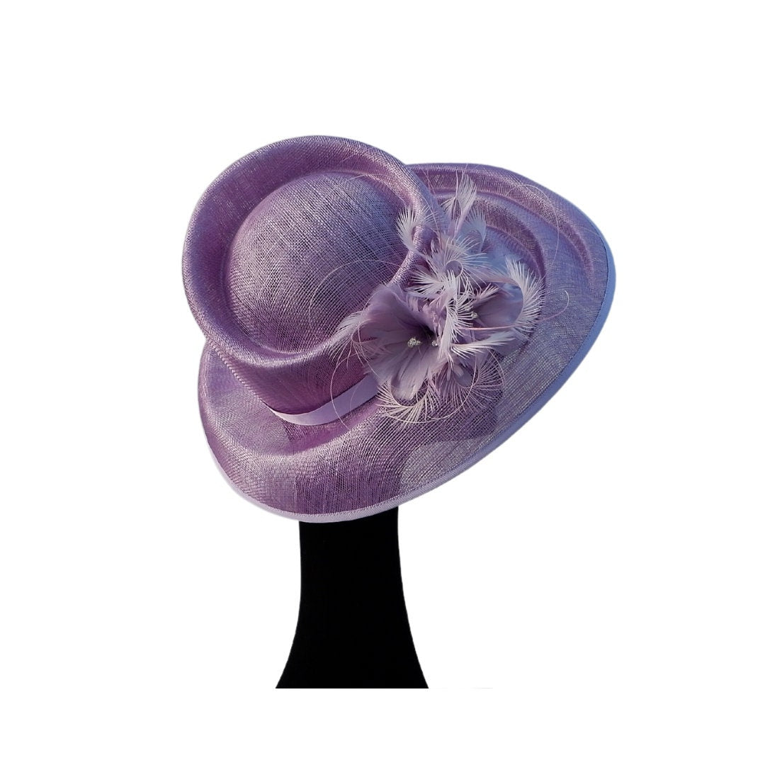 Heather - Stunning detailed feature hat in Lilac with a small feather detail with diamantes
