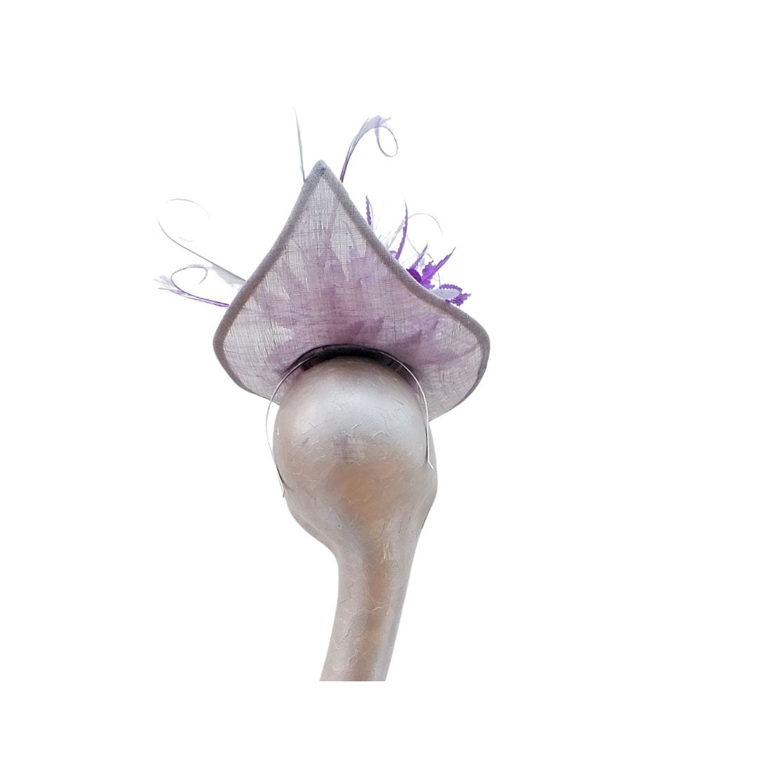 Sika - Irregular Shaped Silver hatinator with Silver & Purple feather detail.