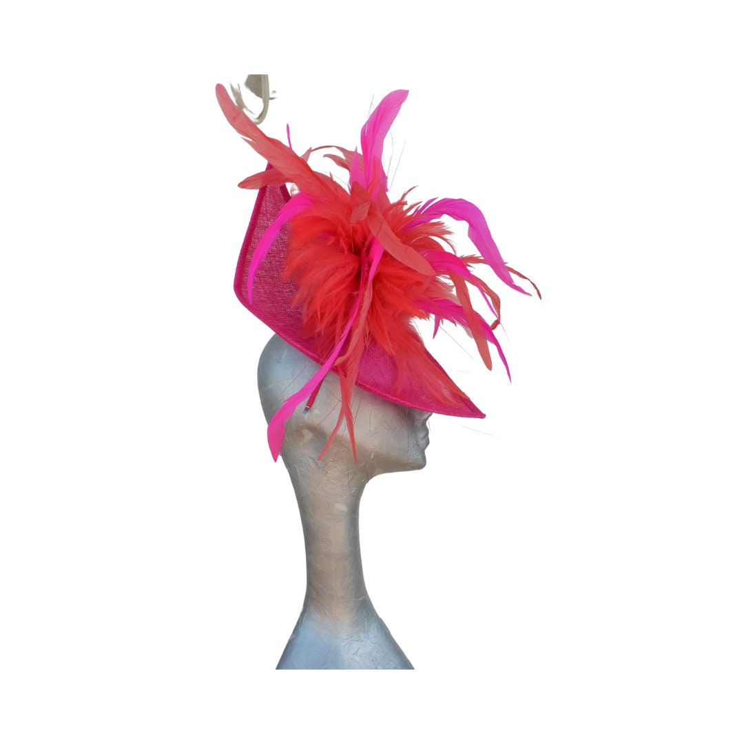 Cereza -Irregular Shaped Cerise pink hatinator with Coral & Cerise feather detail.