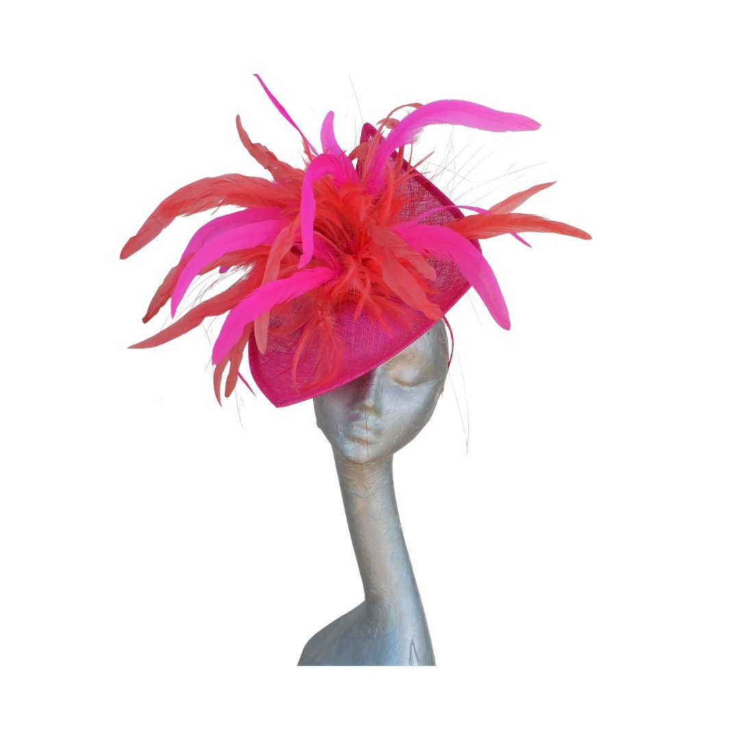 Cereza -Irregular Shaped Cerise pink hatinator with Coral & Cerise feather detail.