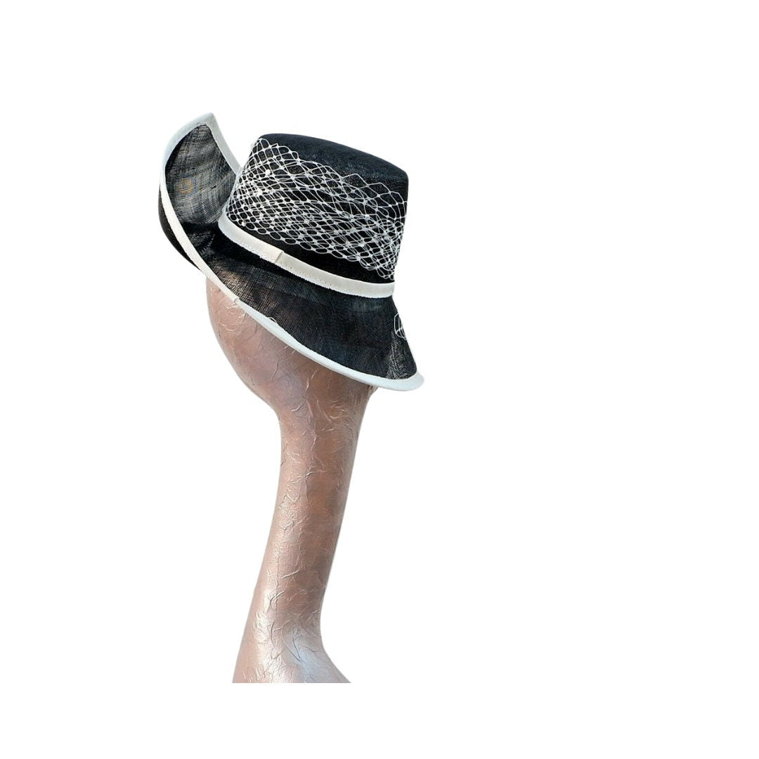 Lara- Stunning feature Pointed side hat In Ivory & Black
