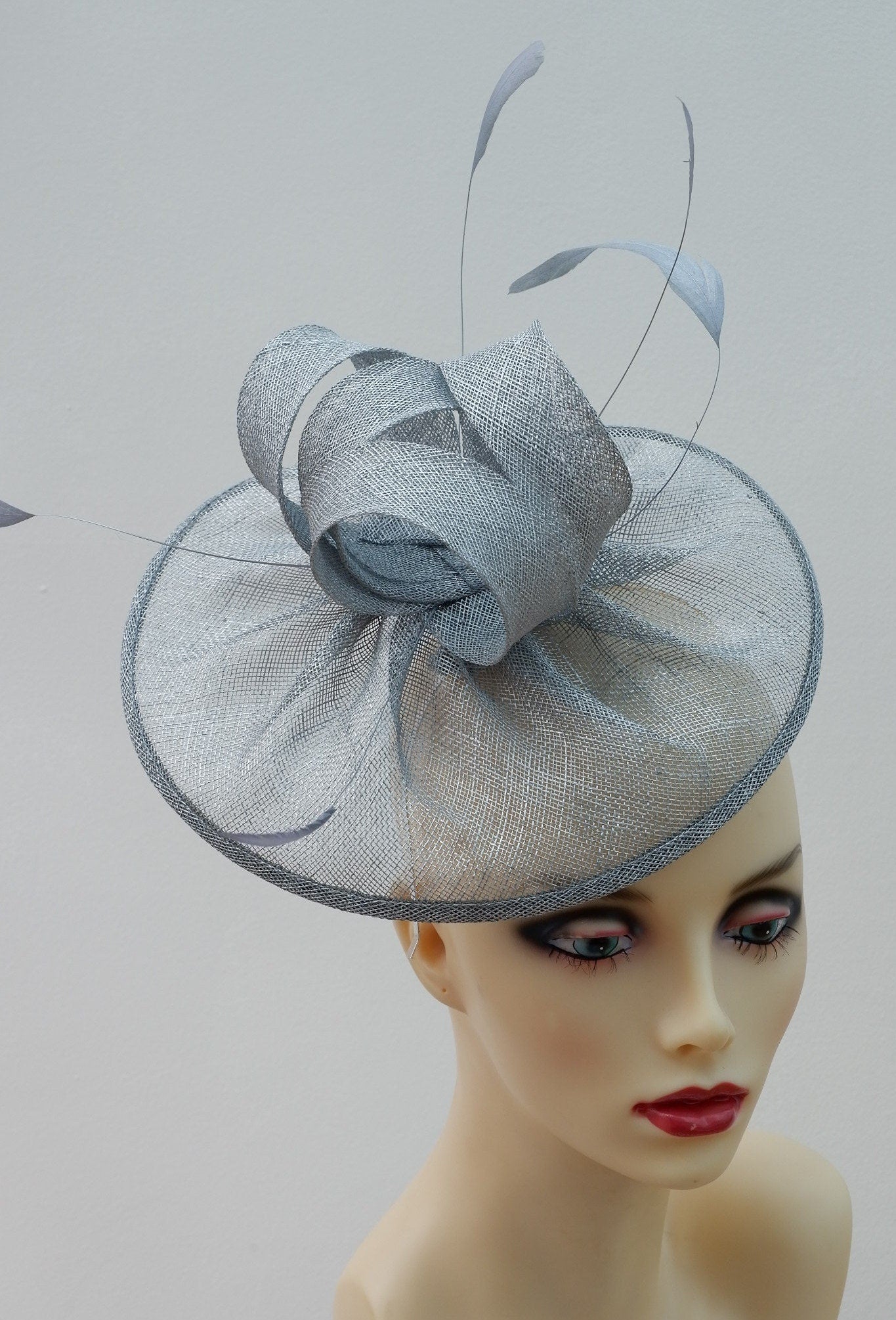 Metallic Silver heart shaped Sinamay fascinator