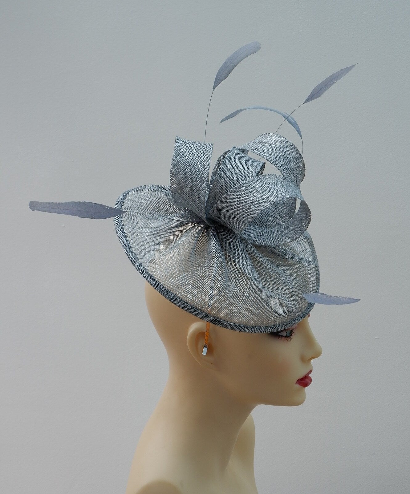 Metallic Silver heart shaped Sinamay fascinator