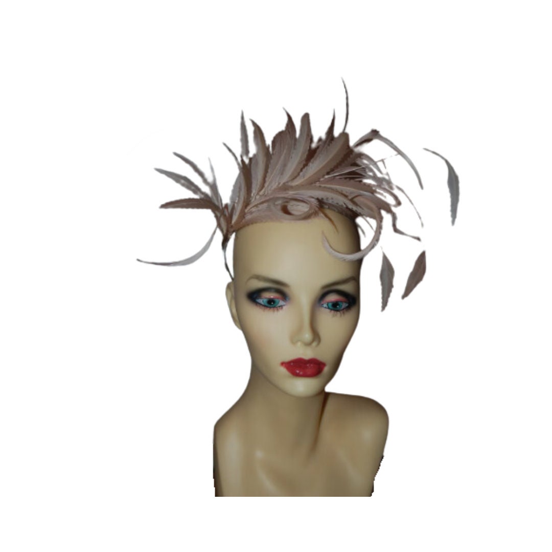Nude feather  fascinator with metal headband by Hats2go