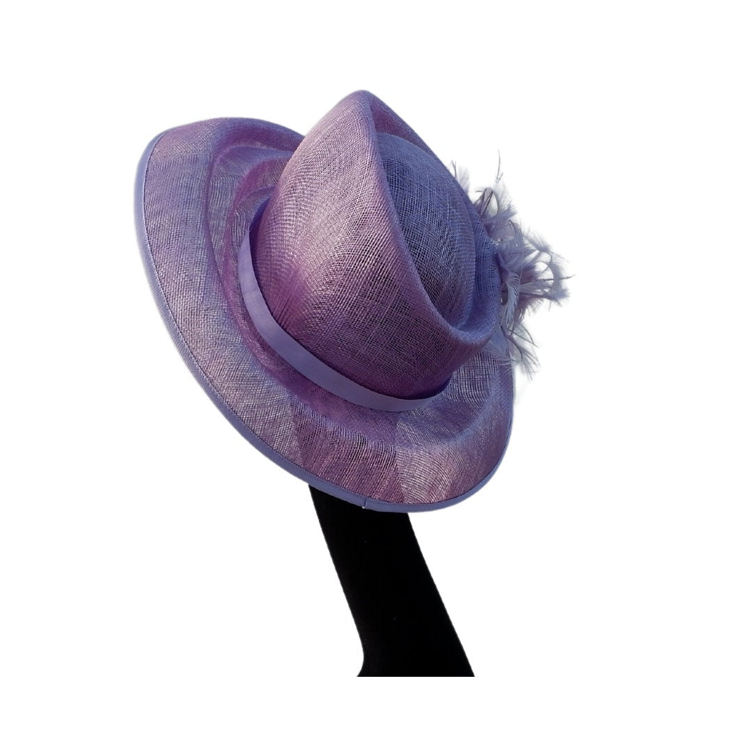 Heather - Stunning detailed feature hat in Lilac with a small feather detail with diamantes