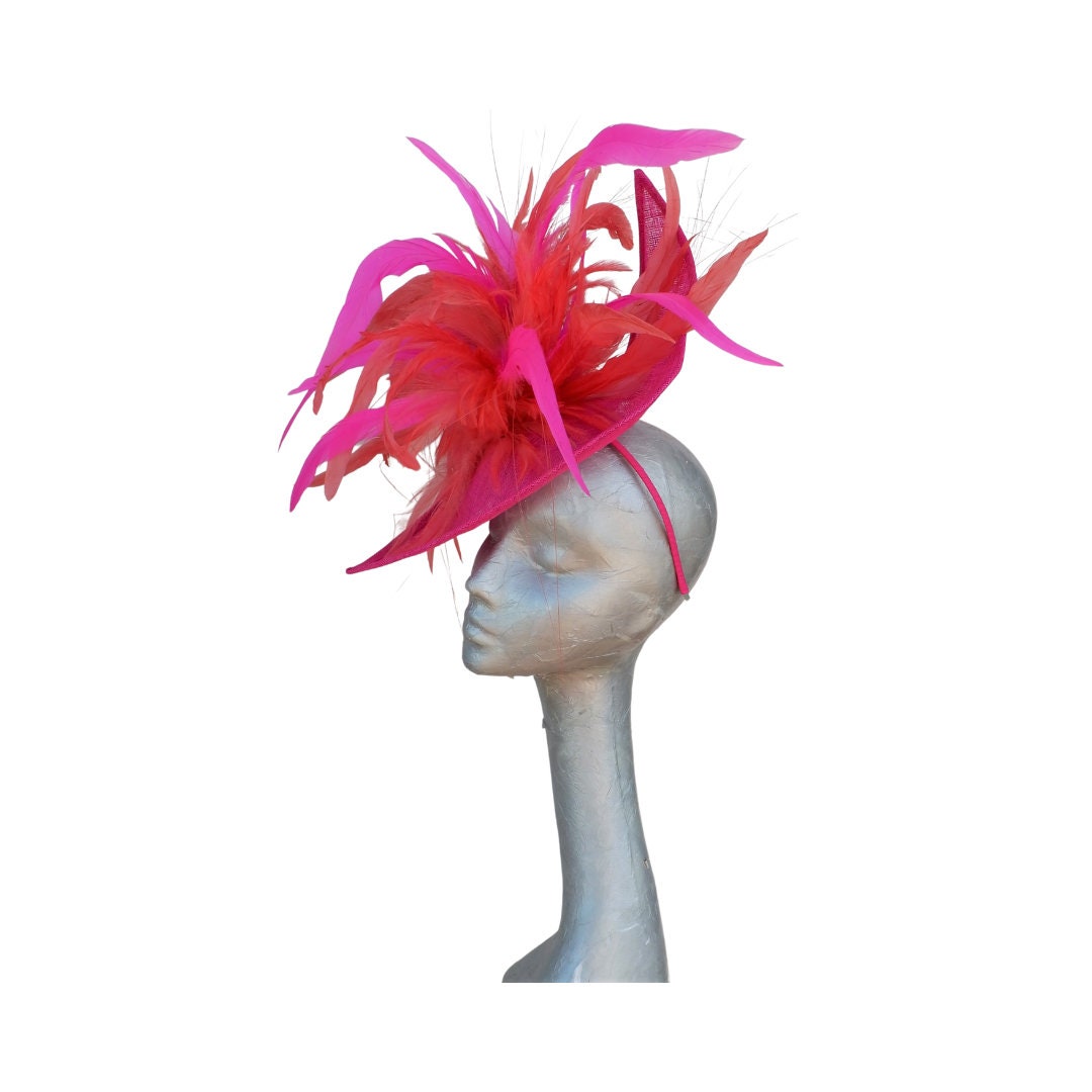 Cereza -Irregular Shaped Cerise pink hatinator with Coral & Cerise feather detail.