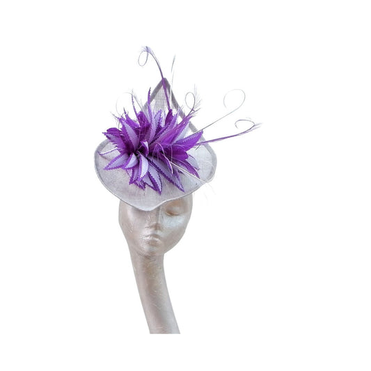 Sika - Irregular Shaped Silver hatinator with Silver & Purple feather detail.