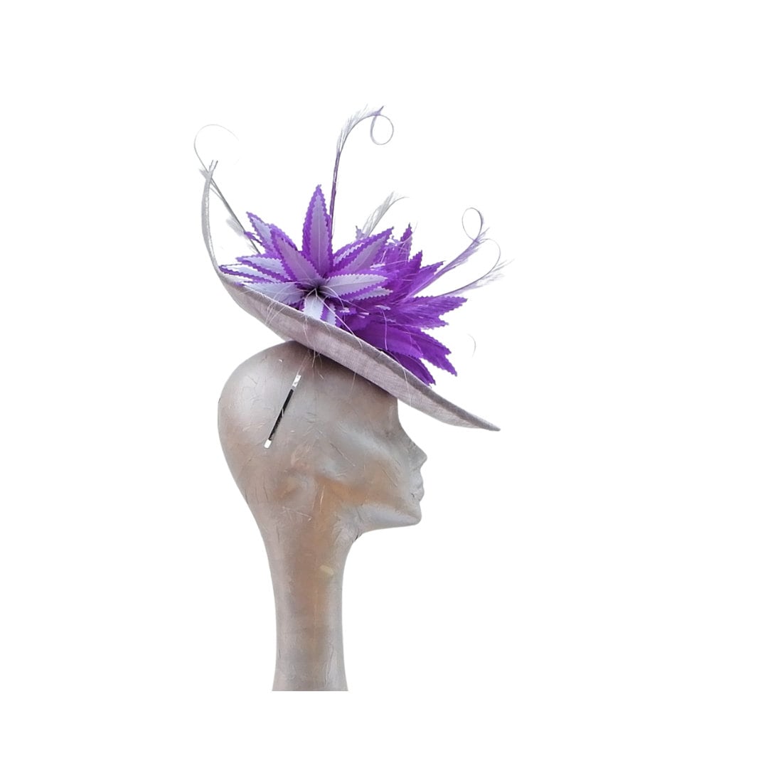 Sika - Irregular Shaped Silver hatinator with Silver & Purple feather detail.